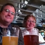Two happy people with beers